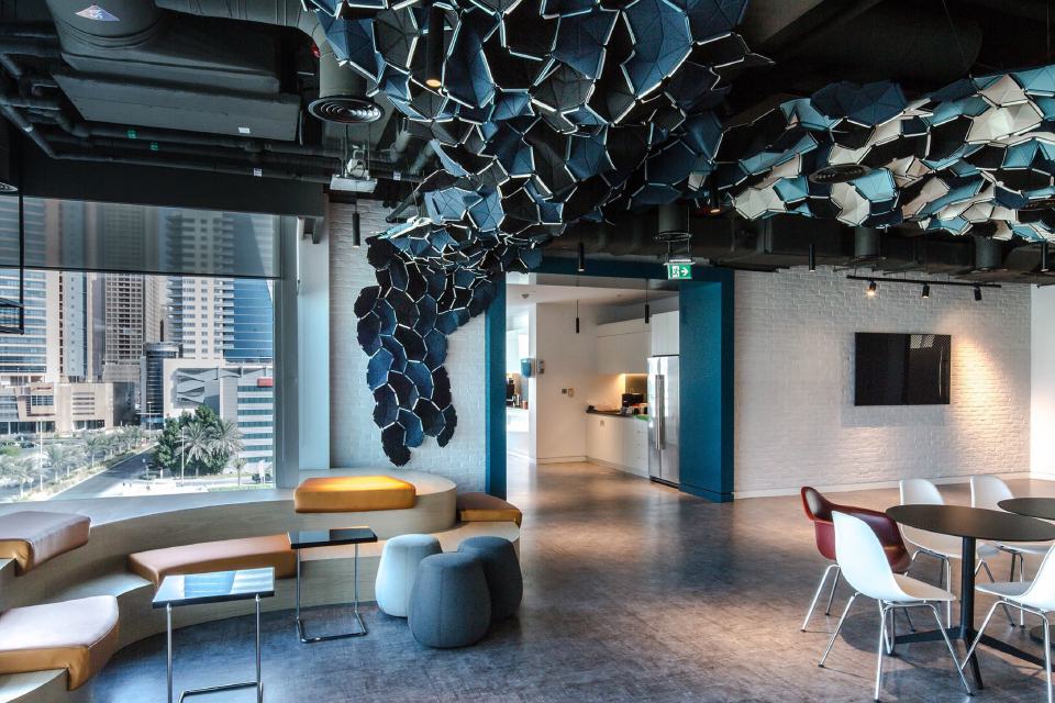 Modern institutional workspace with city views.